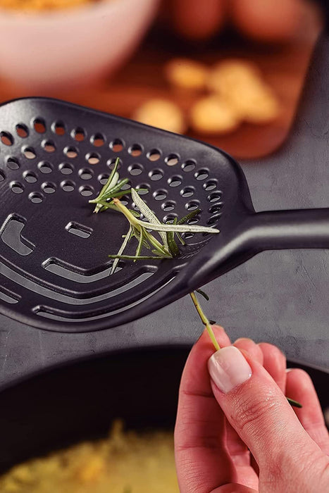 ملعقة بثقوب 35 سم من Tramontina Verano - رمادي